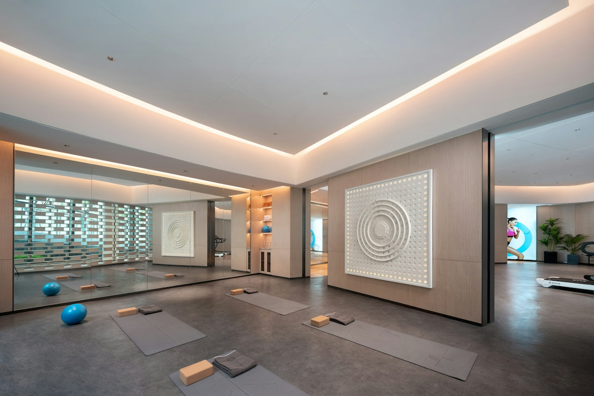 Modern yoga studio with mats and exercise balls