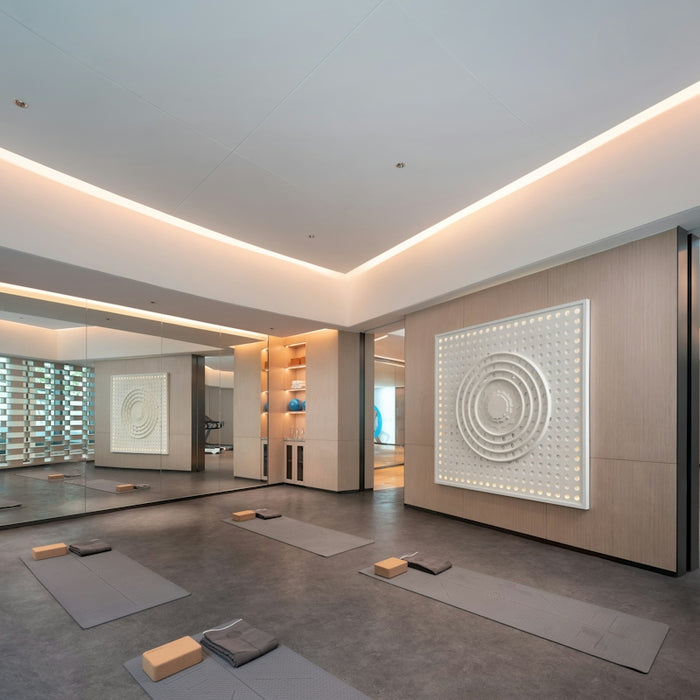 Modern yoga studio with mats and exercise balls